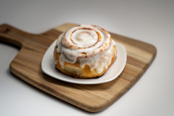 Baked to perfection with cinnamon and
brown sugar layered through each wrap
of dough, this treat is topped off with
our delectable cream cheese frosting.